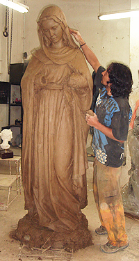 Creating a clay model of a sculpture